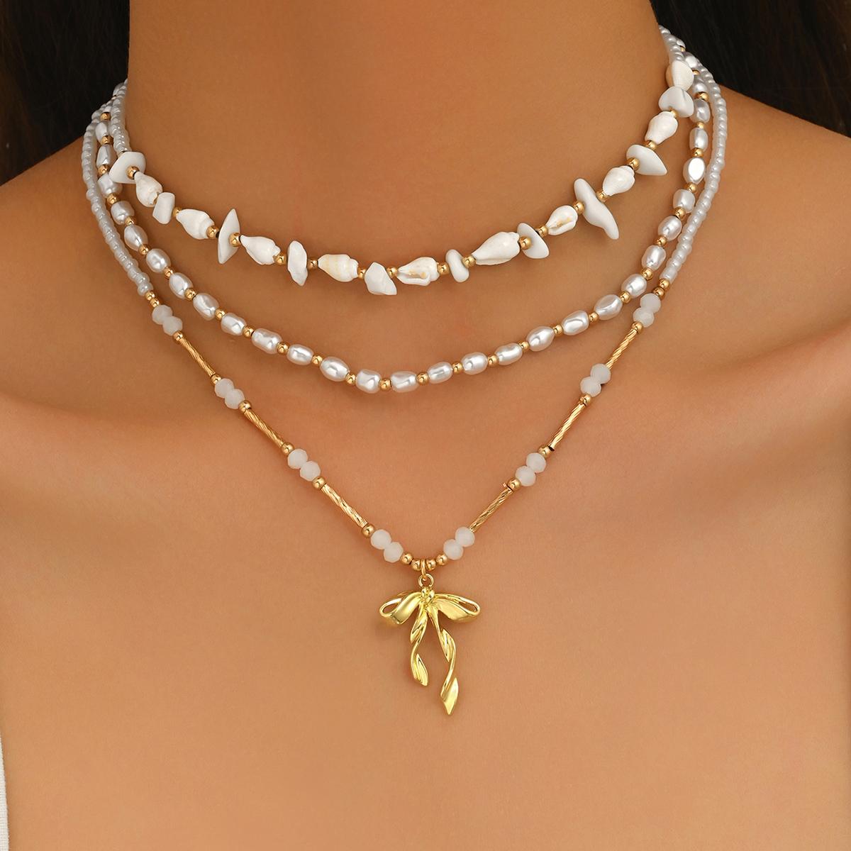

Vintage Boho 3 Layered Shell Pearl Beaded Necklace Gold Bow Pendant Stackable Choker Elegant Summer Beach Jewelry for Women Gift