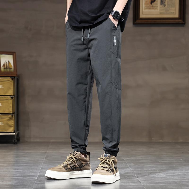 New Men's Spring Tooling Pants Men's Slim Straight Versatile Thin Casual Pants Breathable Foot Tie Trend Brand