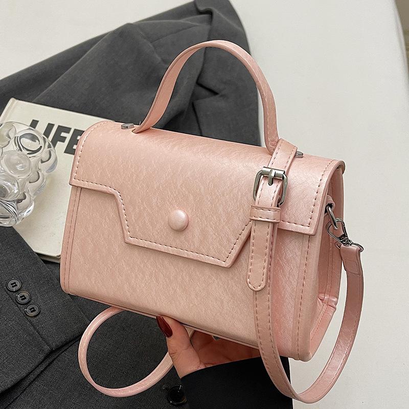 Wholesale new niche high-end sweet simple style solid color portable small square bag foreign style versatile commuter messenger bag