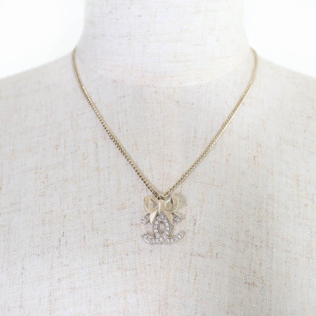 Excellent CHANEL Necklace COCO Mark Ribbon Rhinestone Champagne Gold Women B24K Used