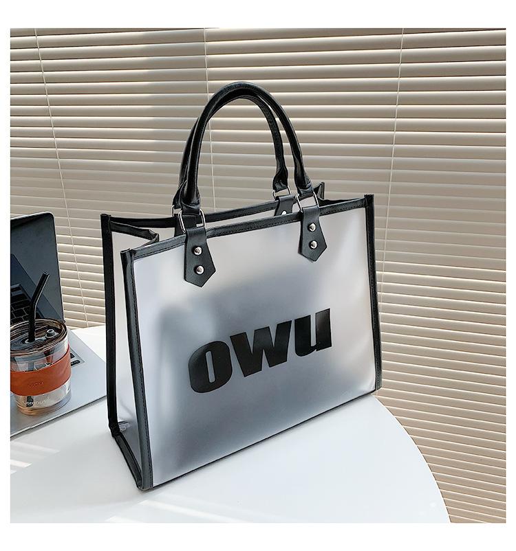 

Summer C transparent jelly bag women s new work tote bag briefcase versatile shoulder tote big bag Letter Bag