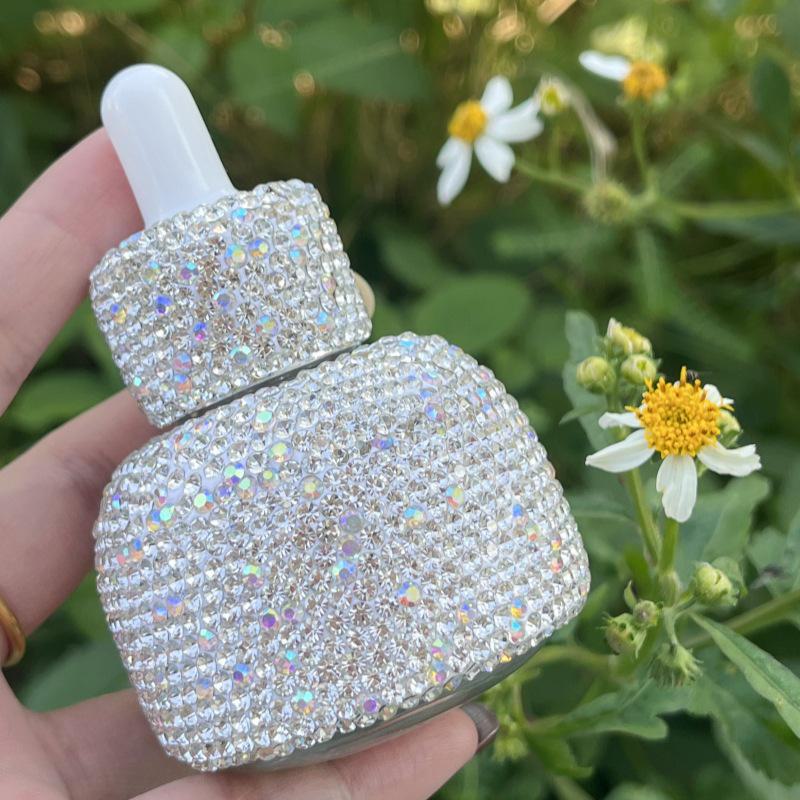 

Роскошный мини-флакон-капельница Diamond: Элегантный белый переносной контейнер для эфирных масел 30ml dropper bottle (full diamond) белый