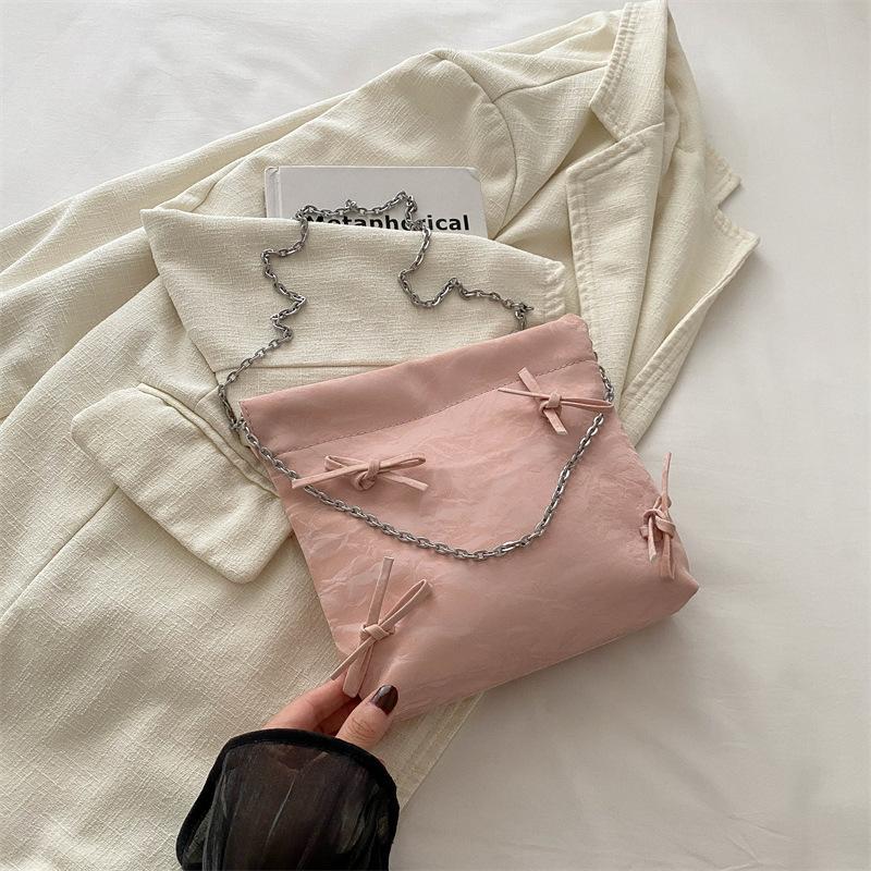 

2025 new portable small bag women s summer Korean version niche fold design simple bucket bag fashion messenger bag розовый