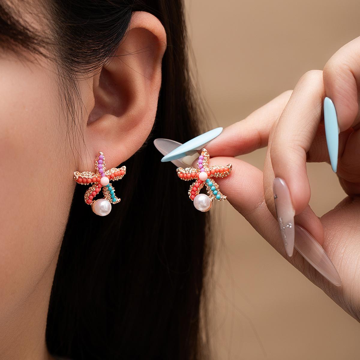 

Summer Vacation Style Colored Starfish Pearl Stud Earrings Women S Seaside Sweet And Advanced Sense Niche Temperament Earrings