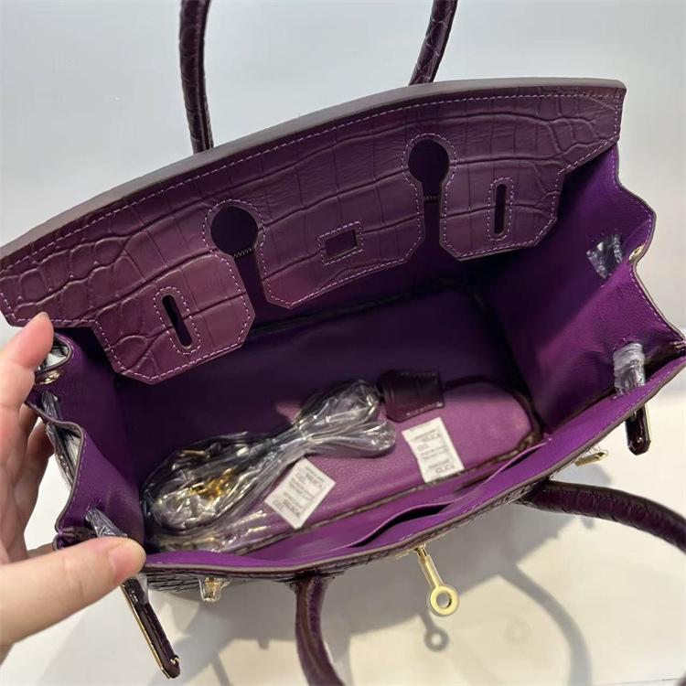 Pelle bovina primo strato motivo alligatore opaca portatile a spalla a tracolla borsa da donna premium transfrontaliera