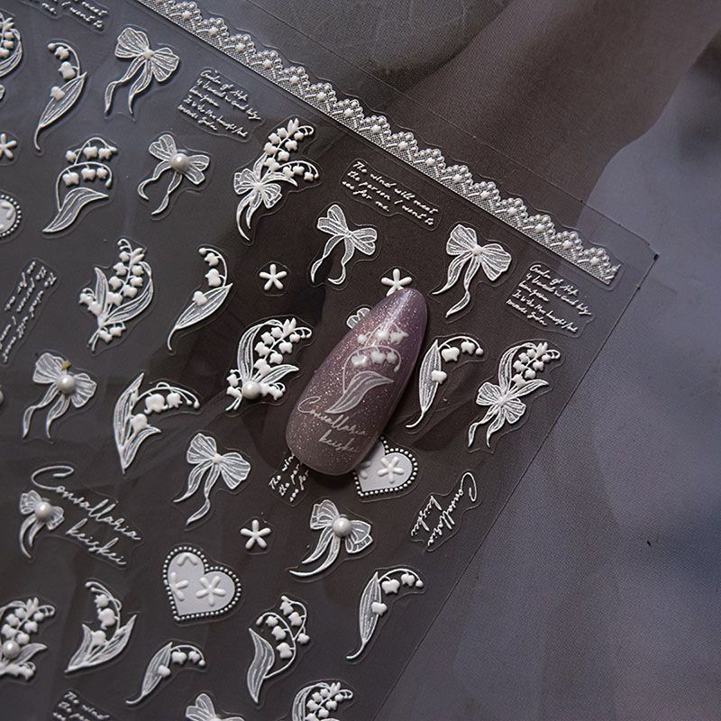 

Pearl White Linglan Lace Flower Nail Art Sticker Tomoni Embossed 5D Bows Heart Nail Sticker Decoration Letter of the Lily of the Valley 4253((Pearl))