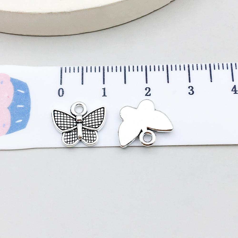 Set di 100 Ciondoli Gatto Farfalla Luna Argento Antico per Braccialetti e Collane Fai da Te