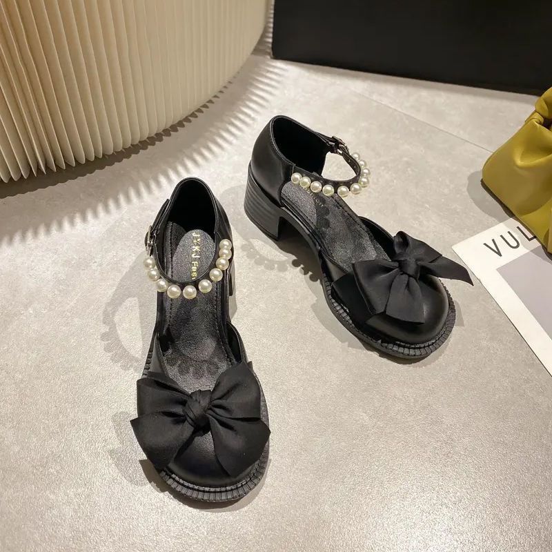 

Bow pearl bag head sandals female 2025 summer new ins with skirt versatile fairy high heel Roman shoes 35