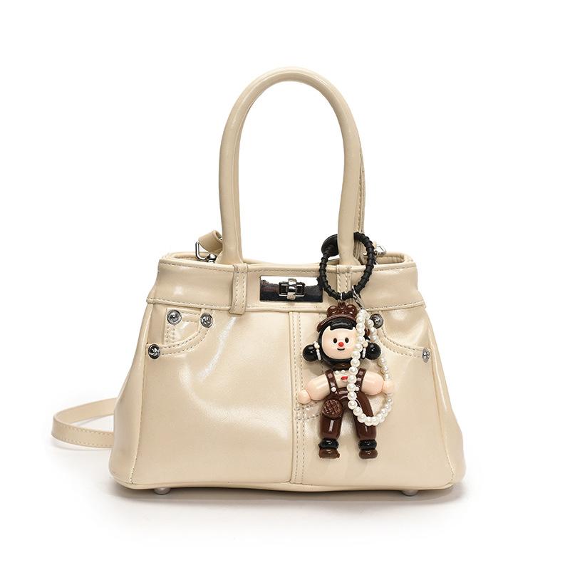 Spring and Summer New French Fashion Commuter Style Portable Bucket Bag Women's Versatile High-quality Foreign Leisure Messenger Bag