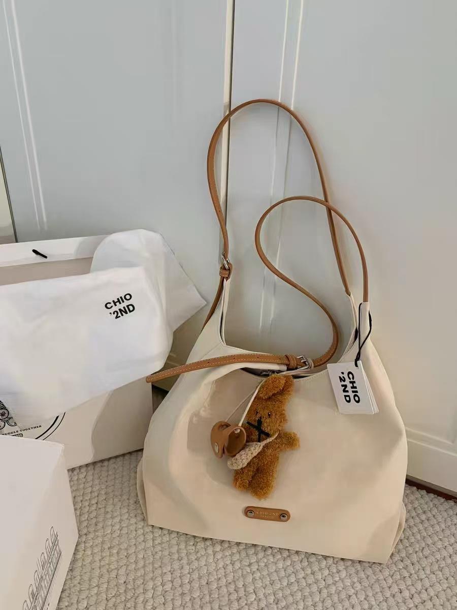 

Nanfeng Versatile Bread Puppy Leaping Clear Sky Pillow Bag Women s 2025 New Spring and Summer Super Hot Handheld Crossbody Bag