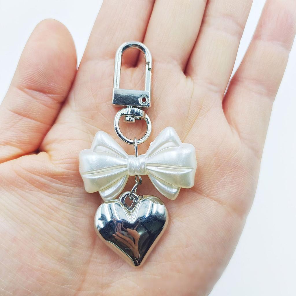 Přívěsek na klíče s přívěskem srdce Bowknot Přívěsek na telefon Odnímatelný přívěsek na telefon Ručně vyráběný přívěsek na klíče Stylový šperk pro tašku na peněženku