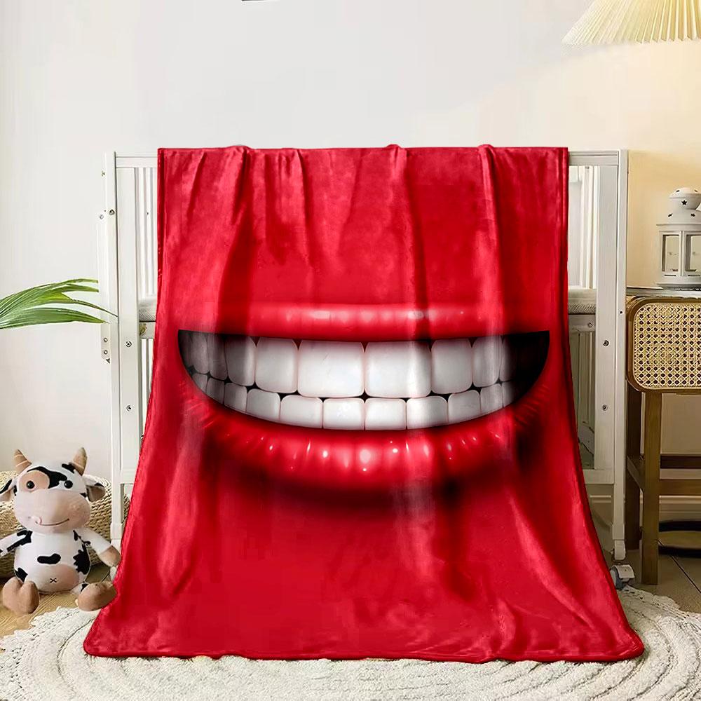 A glossy red smile with bright white teeth on a red background. for all seasons blanket lunch break throw gift 80cm x 120cm