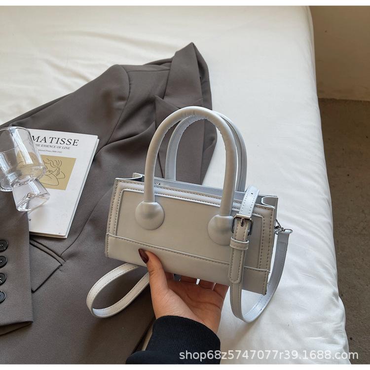Small fresh and simple hand-held small square bag 2025 spring new Korean fashion trendy shoulder bag high-end crossbody bag