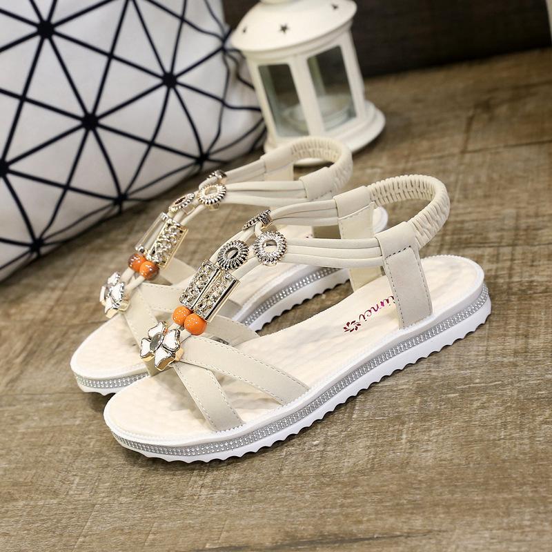 

Spring and summer new fashion flat solid color bohemian beaded sandals open-toed Roman flat sandals women s shoes 40