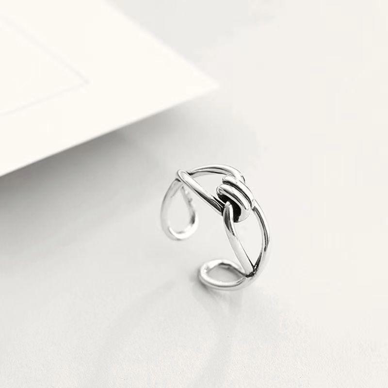 

Мідне регульоване кільце: Холодний стиль, простий нішевий дизайн для жінок і чоловіків – персоналізовані прикраси на вказівний палець. Knotted Cross Ring