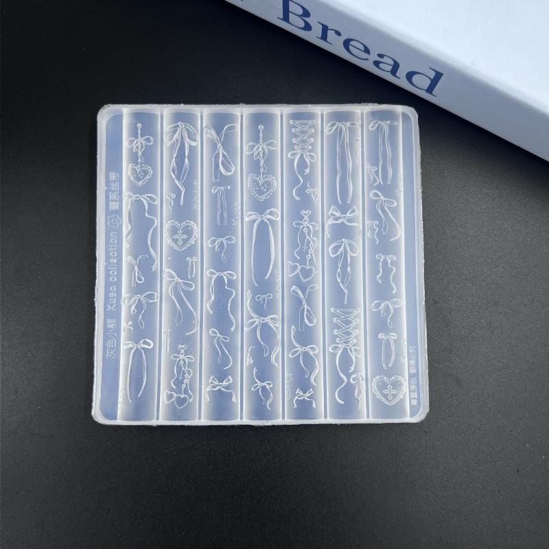 Baroque Nail Art Silicone Mold with Intricate Bow and Butterfly Patterns for Creative Nail Designs