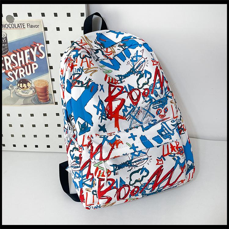 Легкий рюкзак большой вместимости Новая корейская школьная сумка Высокая ценность Модный и крутой Персонализированный рюкзак с граффити