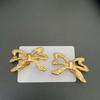 Delicate And Stylish Vintage Bowknot Ear Clip Craft Of Polished Copper With Gold Finish