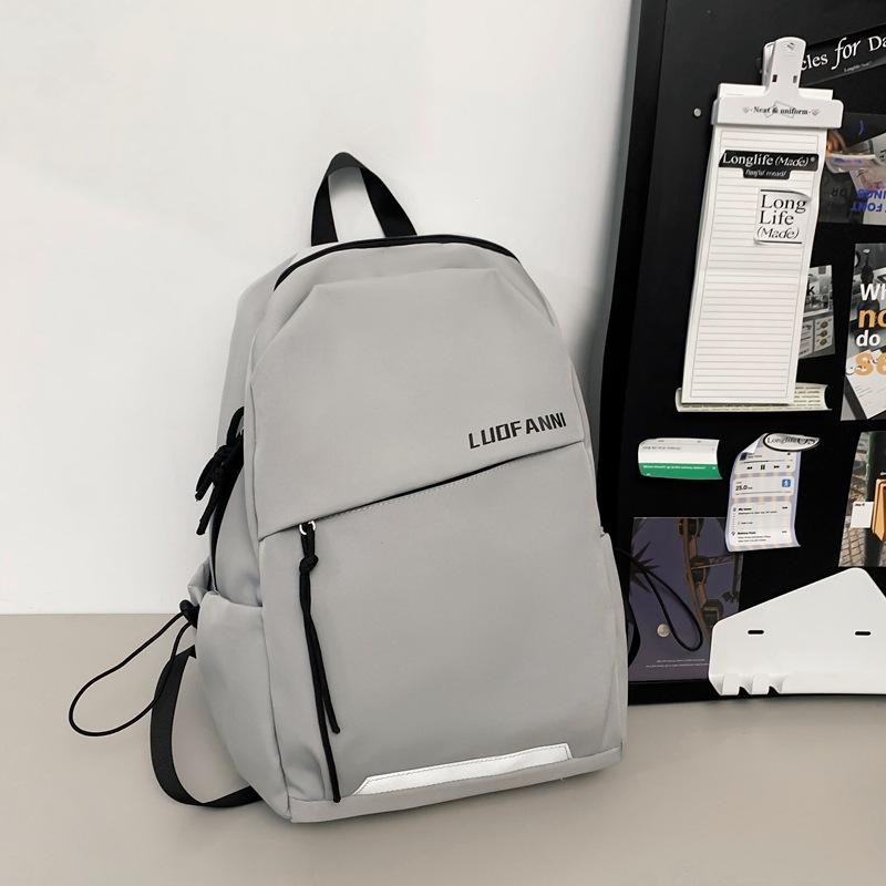 Schoolbag schoolbag female college student ins trendy brand backpack men's sense lightweight travel backpack simple solid color printing