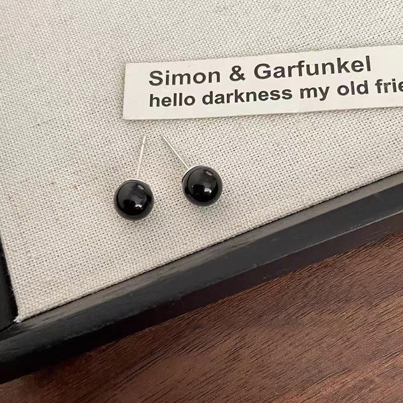 

Серьги из серебра с жемчугом и бриллиантами - Элегантный нишевый дизайн для женщин