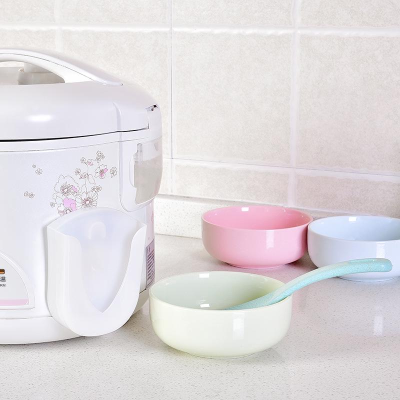 Suction cup type rice spoon holder kitchen plastic spoon rack rice scoop wall hanging shovel rack