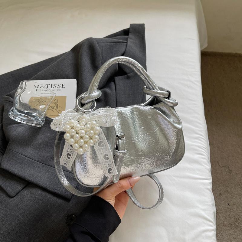 

Temperament portable small bag women 2025 summer new dumpling bag versatile fashion daily commuter messenger bag серебряный