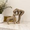 A Woman Kissing a Small Dog Resin Figurine a Warm Pet Interaction Scene Sculpture Sandstone Resin Ornament