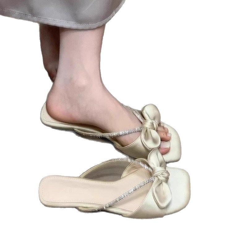 Fashion summer French retro bow open-toed slippers women's rhinestone sweet cool slippers low heel versatile one-word drag