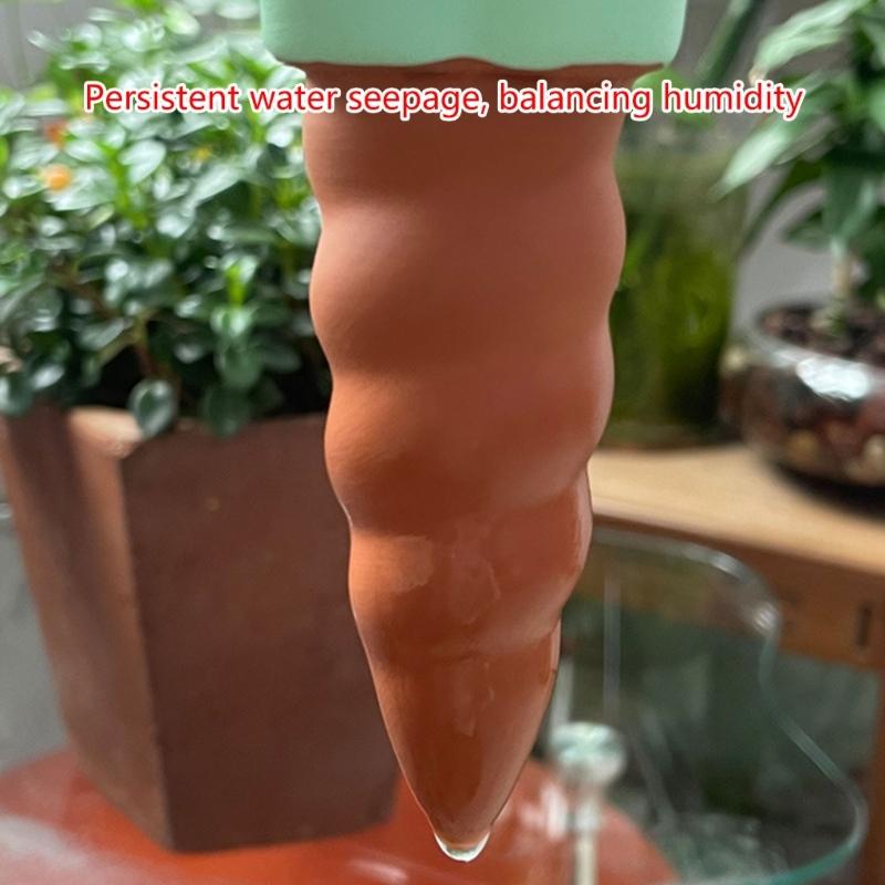 4 macetas autorriego con forma de elefante de terracota, con pinchos y globos autorriego.