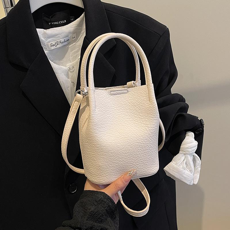 Premium Sense Niche Child Mother Bag Women's Spring and Summer 2025 New Retro Messenger Bag Women's Hand-held Pleated Bucket Bag