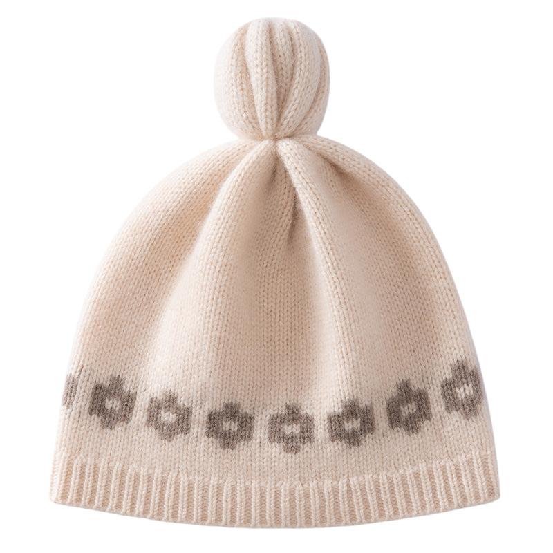 Cashmere jacquard handball knitted hat women's autumn and winter warm ear protection versatile hat solid color pullover hat