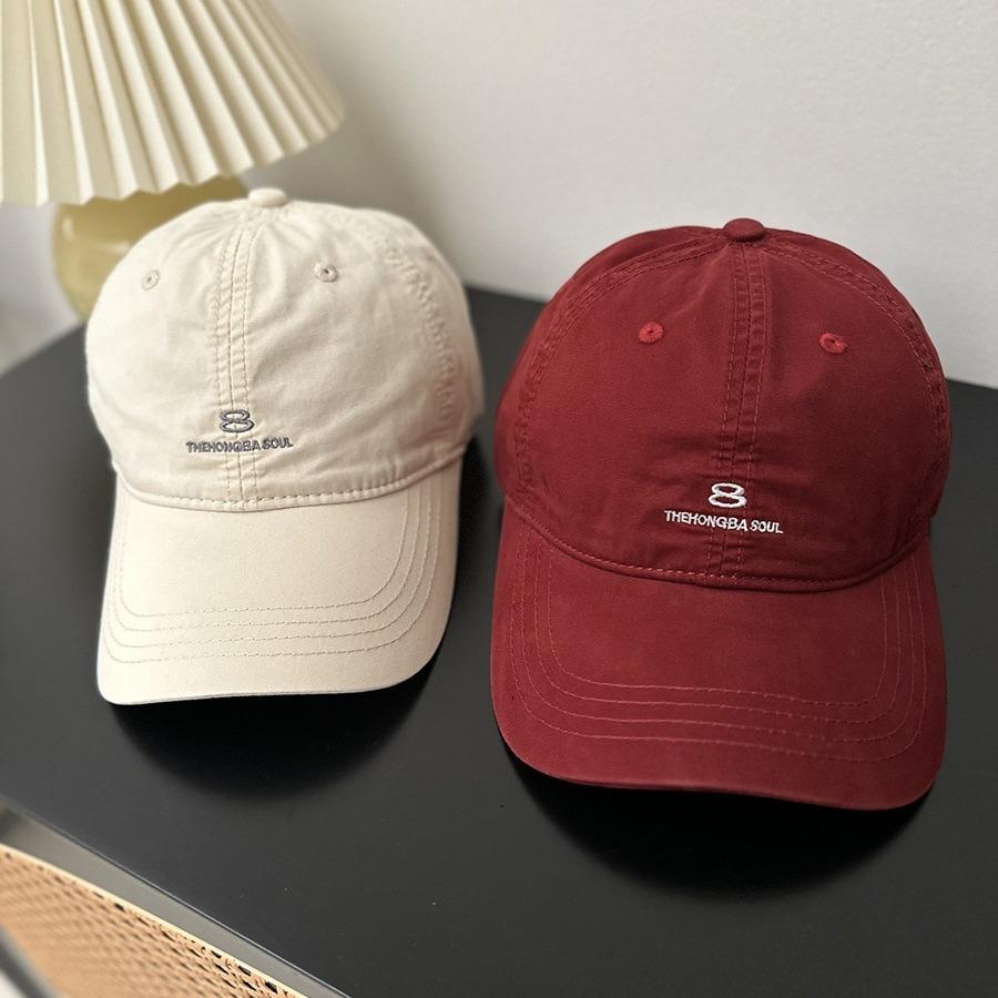 American street style embroidered baseball cap for women, designed for larger head sizes to create a slimming effect. features 