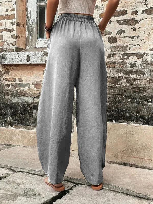 Women's Solid Color Casual Pants with Pockets and Elastic Waist.