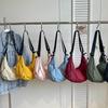 2026 Women's Versatile Casual College Crescent Dumpling Crossbody Bag