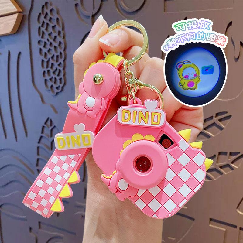 

Cartoon Plaid Dinosaur Projection Camera Keychain Creative Car Bag Doll Pendant New Small Gift opp bag packaging