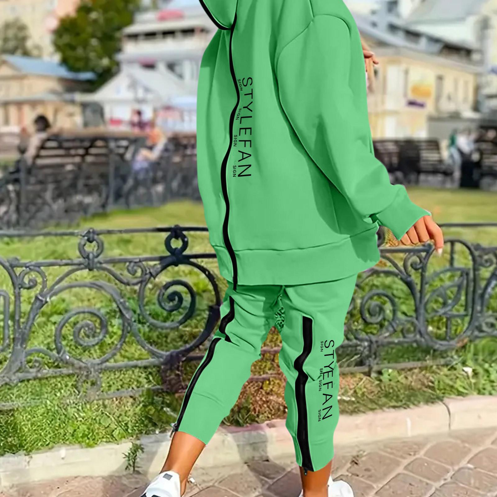 

Женский комплект из двух предметов с длинными рукавами, длинными брюками и капюшоном на молнии L зелёный
