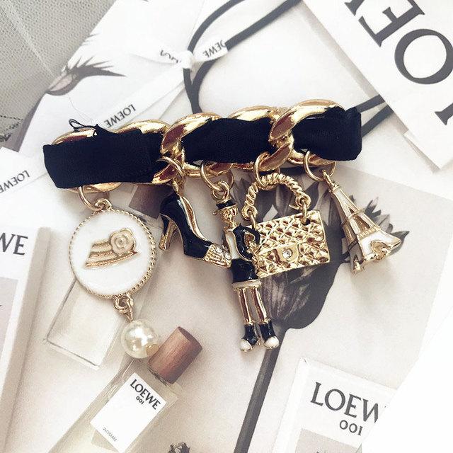 

Ретро Камелия Роскошный бренд Стиль Цветы Нагрудные Булавки Номер 5 Жемчуг Броши Цветок Брошь Ювелирные Изделия Для Женщин