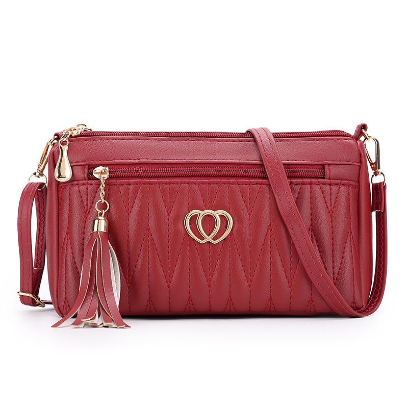 

Mom bag in women s high-end small bag messenger bag women s niche fringed soft leather mailman women s bag