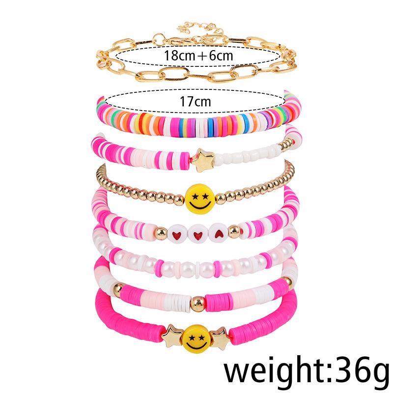 Korean version of fashion new multi-layer elastic thread soft pottery love smiley face bracelet set retro handmade pearl jewelry women