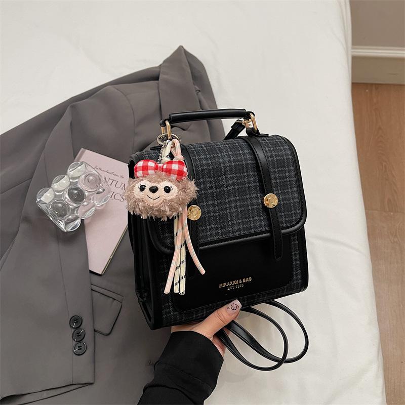 Schoolbag Korean plaid British style backpack women's 1011 new niche foreign style shoulder bag exquisite light luxury messenger bag