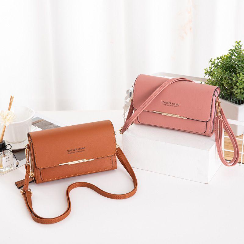 Elegant Leather Shoulder Bag For Women With High Capacity And Adjustable Strap