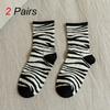 2 Pairs Women Cartoon Mid Tube Socks Fashionable Cow Zebra Print Pattern College Style Cute Comfortable Casual Round Neck Socks