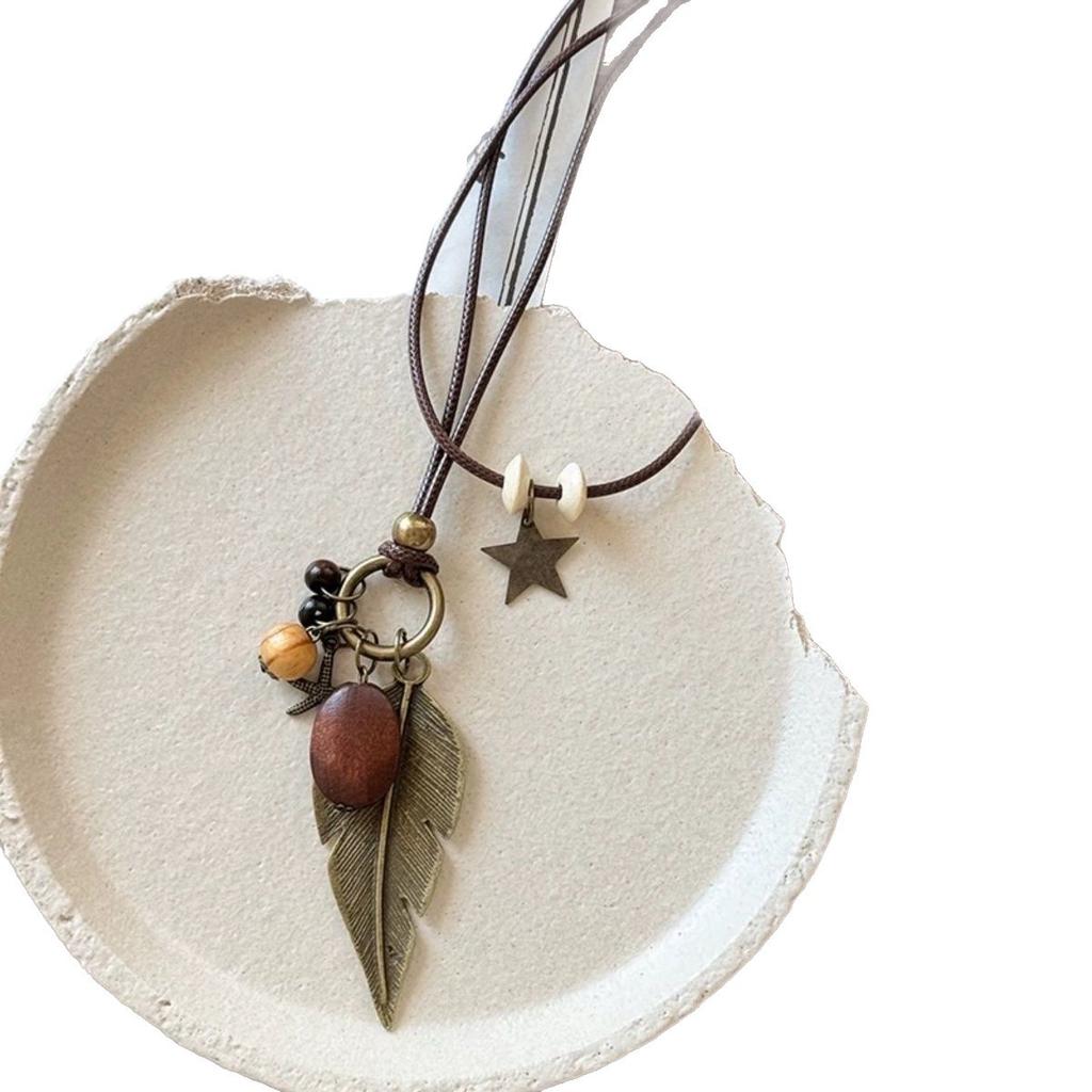 New Chinese Zen necklace women's bronze feather leaves long bohemian retro ethnic style long pendant