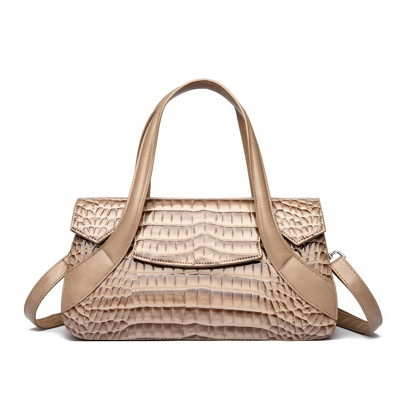 Diese Handtasche ist eine Damenhandtasche mit großem Fassungsvermögen und Krokodilmuster.. Es kann in der Hand, über der Schulter oder als Umhängetasche getragen werden.