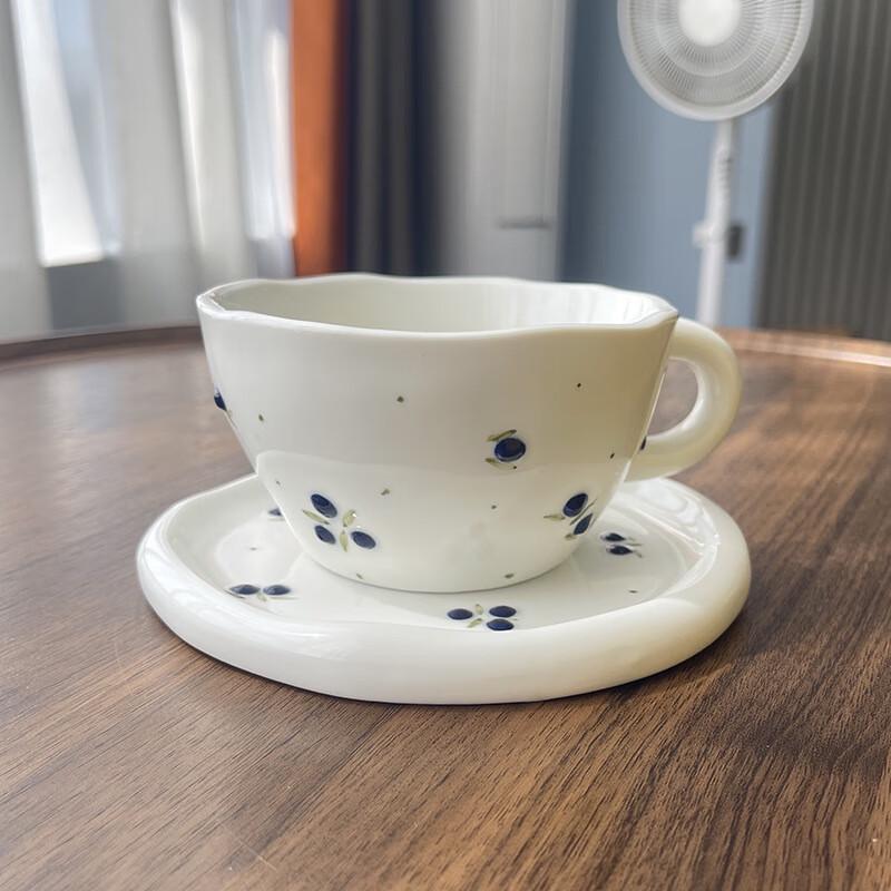 

Hand-Painted Ceramic Coffee Cup with Saucer