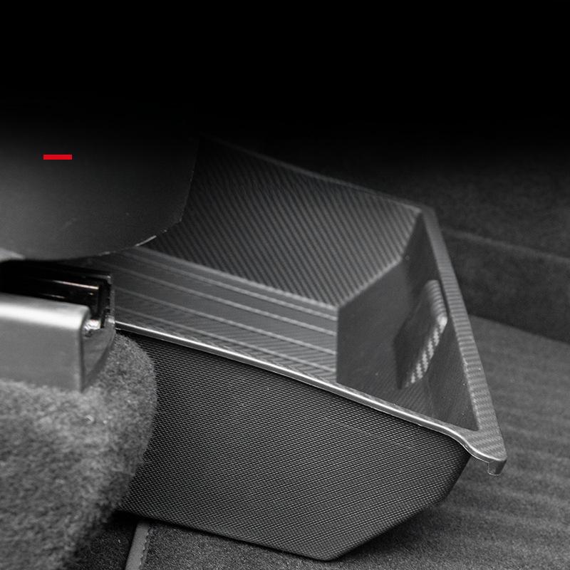 Versteckte Schubladen-Aufbewahrungsbox unter dem Sitz des Tesla Model Y