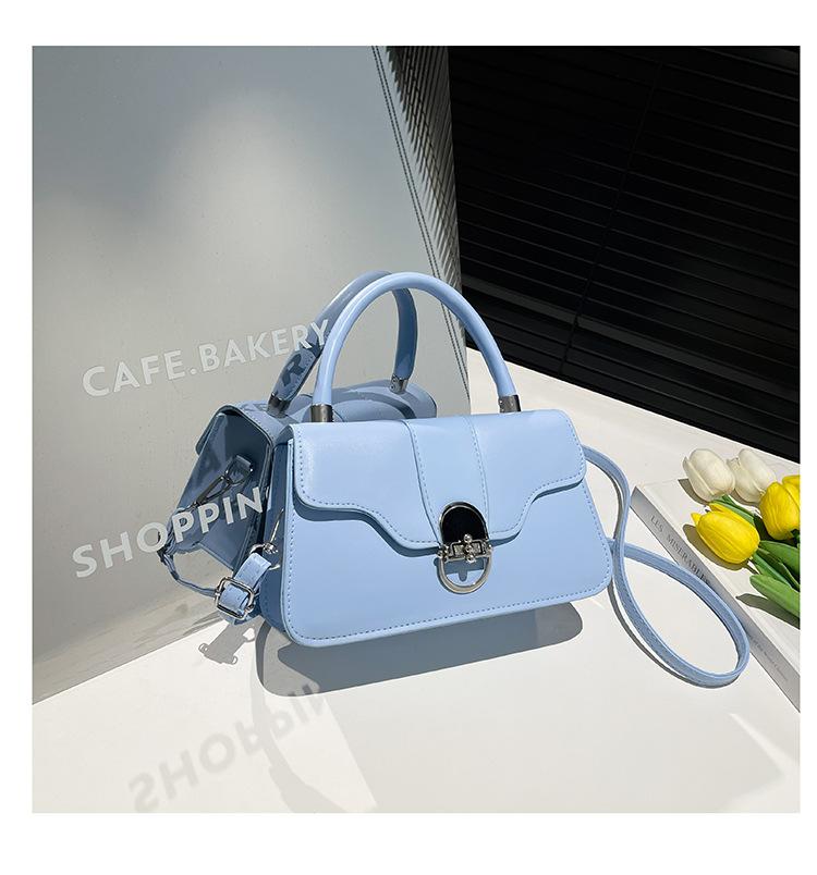 

Korean version niche design portable commuter bag women s 2025 new trendy fashion solid color small square bag shoulder messenger bag синий