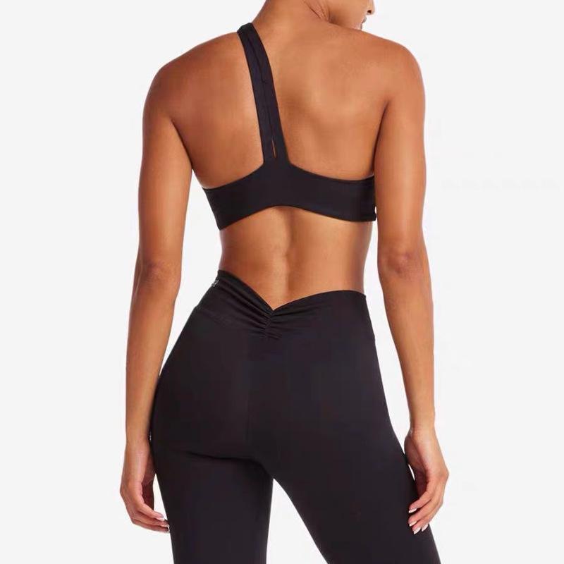 "Elegant Cross-Back Yoga Vest: Sexy, Hollow Design for Female Fitness & Dance Training"