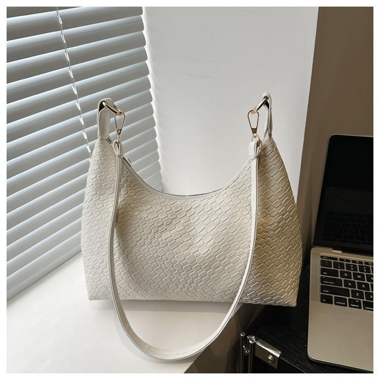 Retro Popular Fashion Woven Pattern Commuter Dumpling Bag 2025 New Portable Large Capacity Simple Niche Armpit Bag