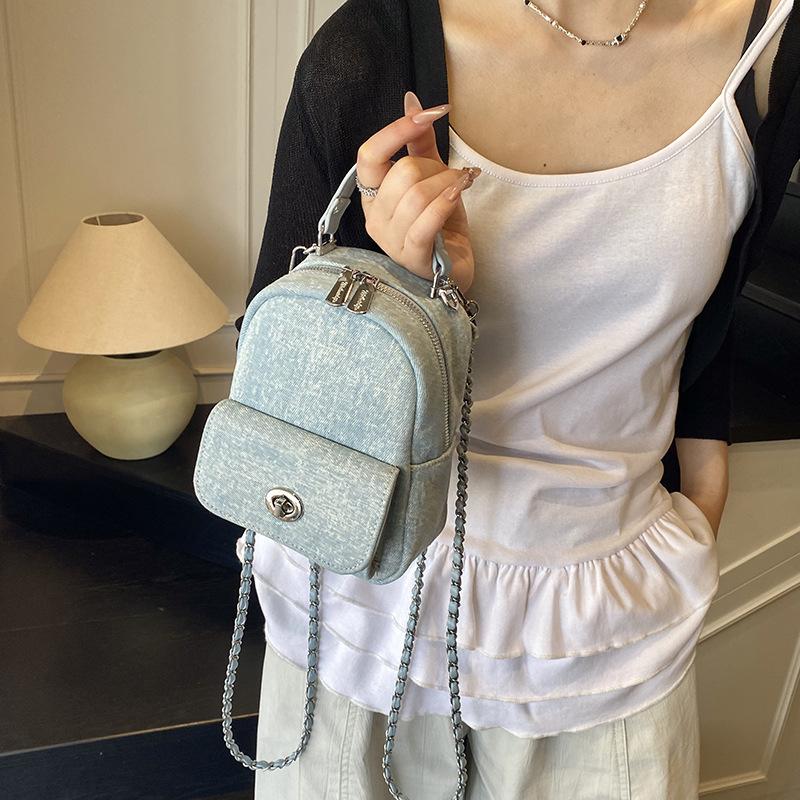New denim blue mini portable backpack women's 2025 spring and summer chain simple contrasting color lock fashionable small backpack